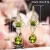 Huitan-pendientes colgantes estéticos para mujer, accesorios elegantes de compromiso de boda con perlas de imitación, joyería de fiesta CZ verde brillante con incrustaciones